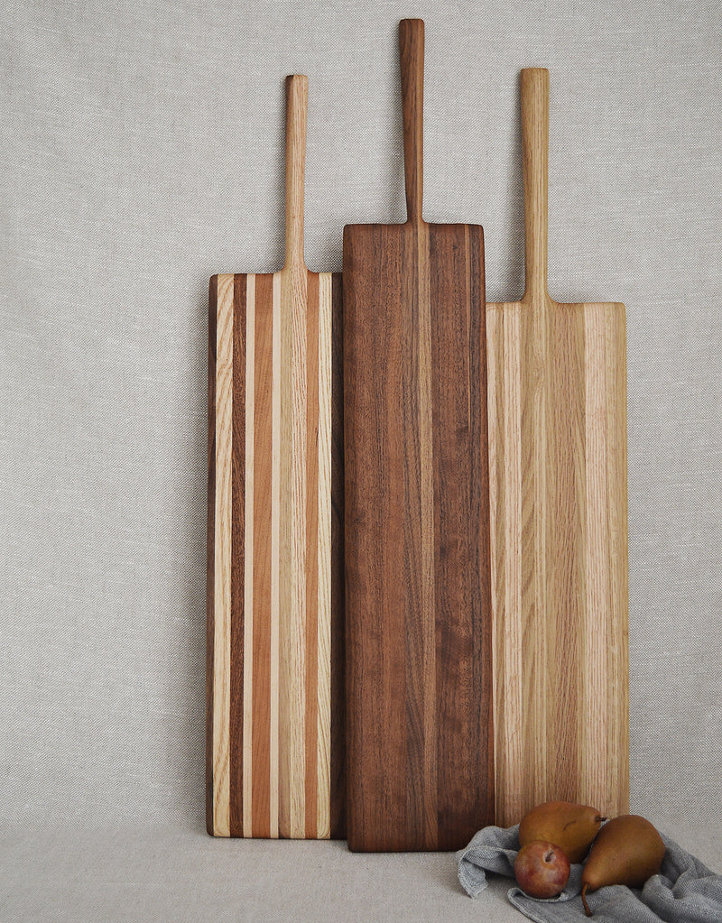 Long, oversized wood serving cutting boards will make a statement at your next dinner party. Handcrafted in Brooklyn by Phil Gautrau Design of locally-sourced and repurposed wood, Oak , Mixed Wood or Walnut