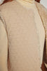 Close-up of a lining of reversible beige wool vest