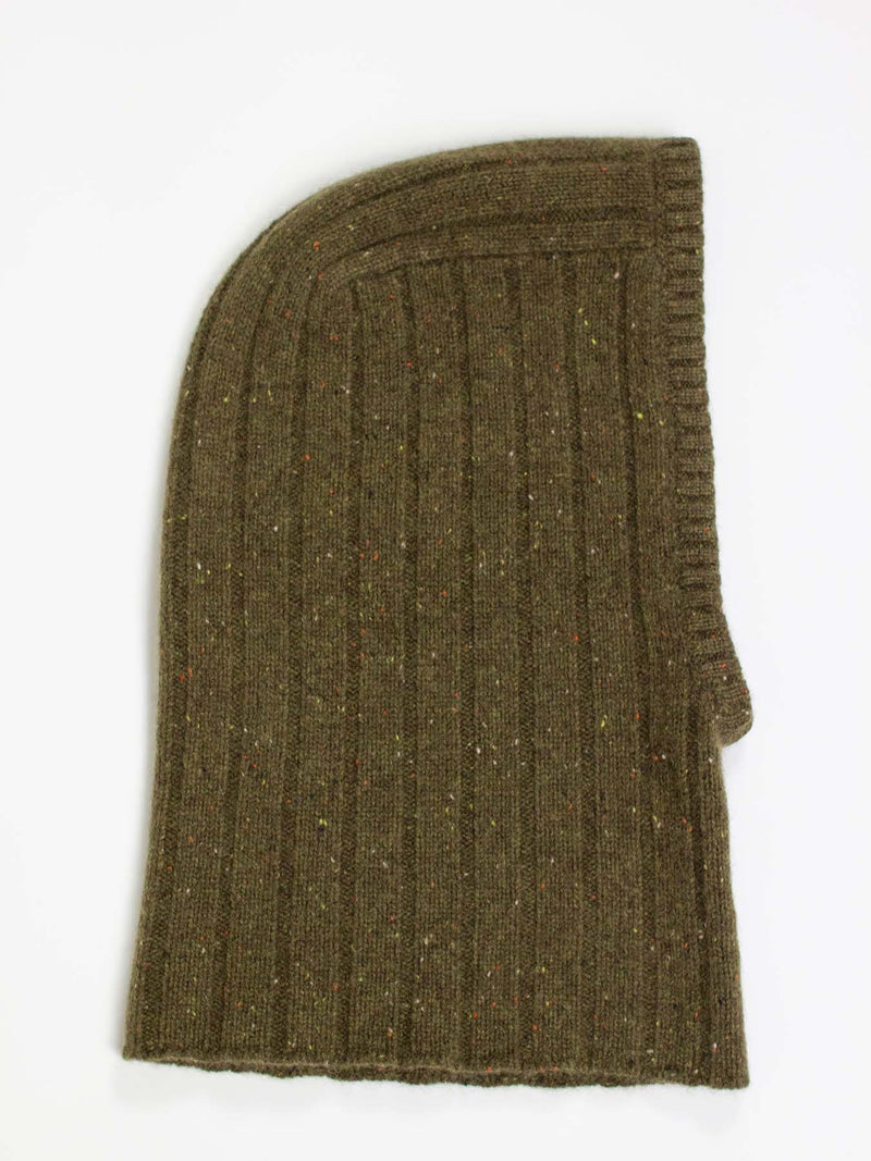 Green knitted balaclava on a white background