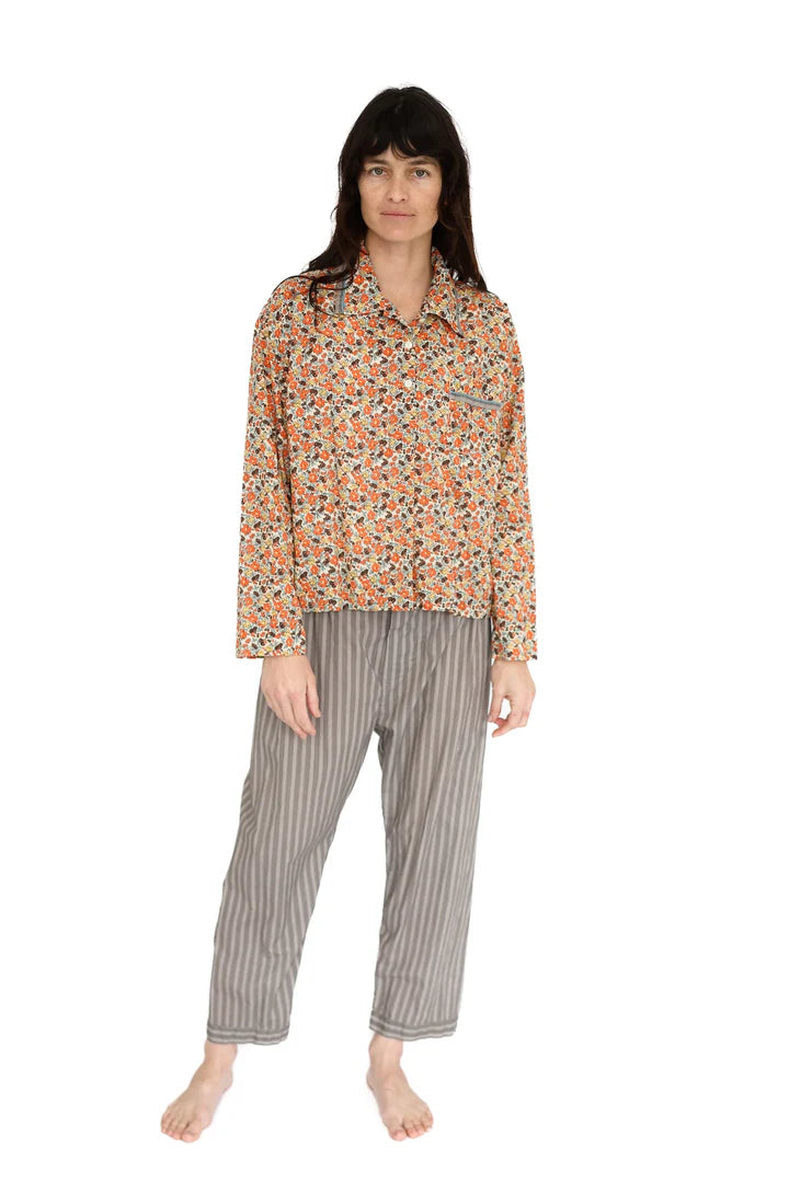 Woman wearing a floral pajama top and striped pants on a white background

Domi pullover shirt organic cotton pjs pajamas sleepwear loungewear shop boston sowa boutique store gift