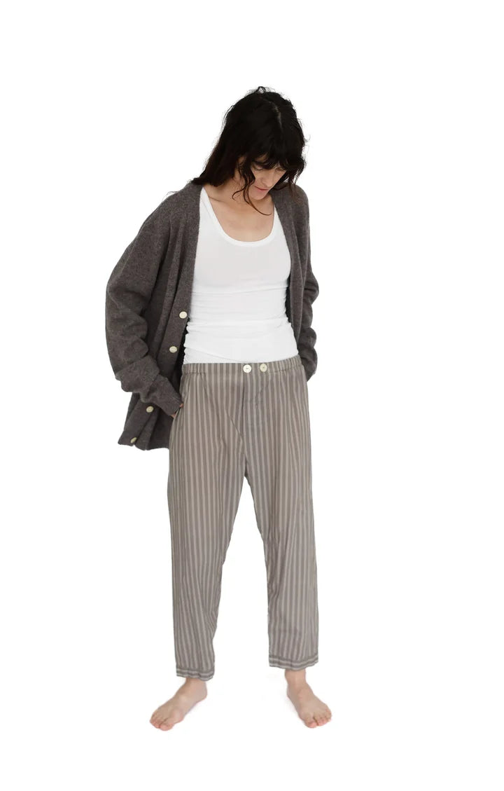 Person wearing a gray cardigan, white tank top, and striped pants on a white background

Domi Midi organic cotton striped pants pjs pajamas sleepwear loungewear shop boston sowa boutique store gift
                                                                            
