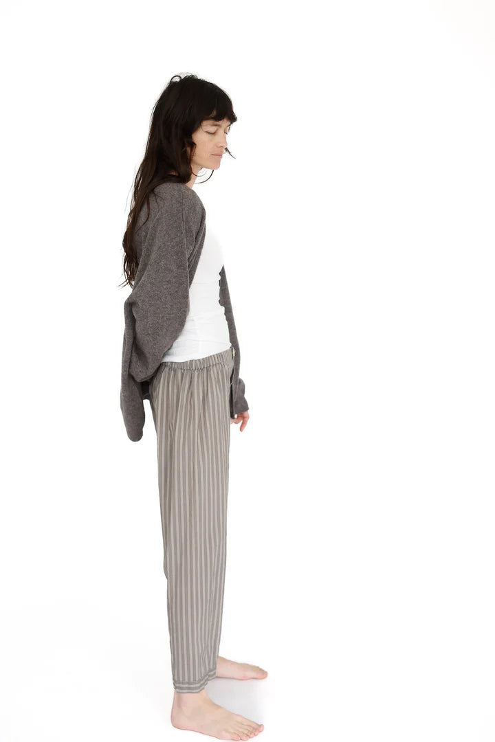 Woman wearing a gray cardigan, white shirt, and striped pants on a white background

Domi Midi organic cotton striped pants pjs pajamas sleepwear loungewear shop boston sowa boutique store gift
                                                                            
