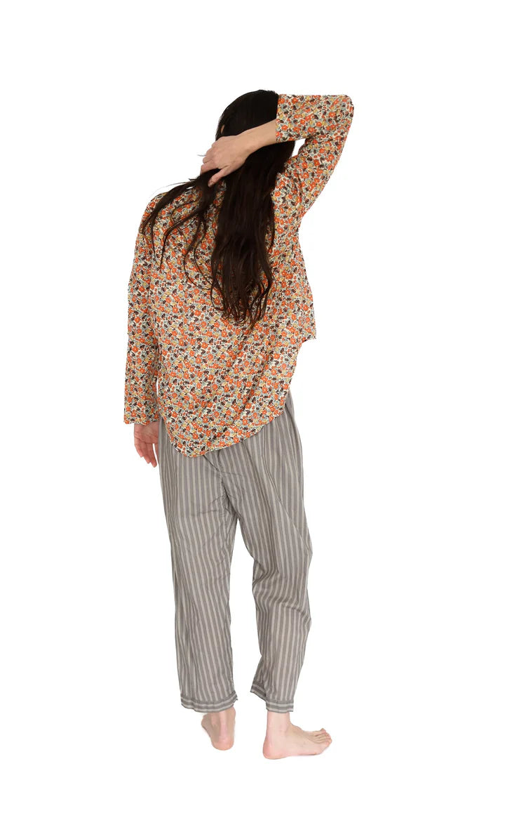 Person wearing a floral top and striped pants on a white background

Domi Midi organic cotton striped pants pjs pajamas sleepwear loungewear shop boston sowa boutique store gift
                                                                            