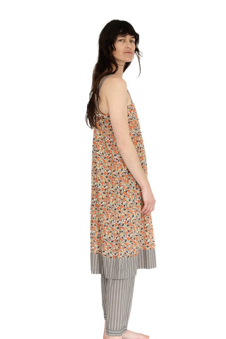 Woman wearing a floral dress with a white background

Domi slip dress nightgown organic cotton pjs pajamas sleepwear loungewear shop boston sowa boutique store gift
