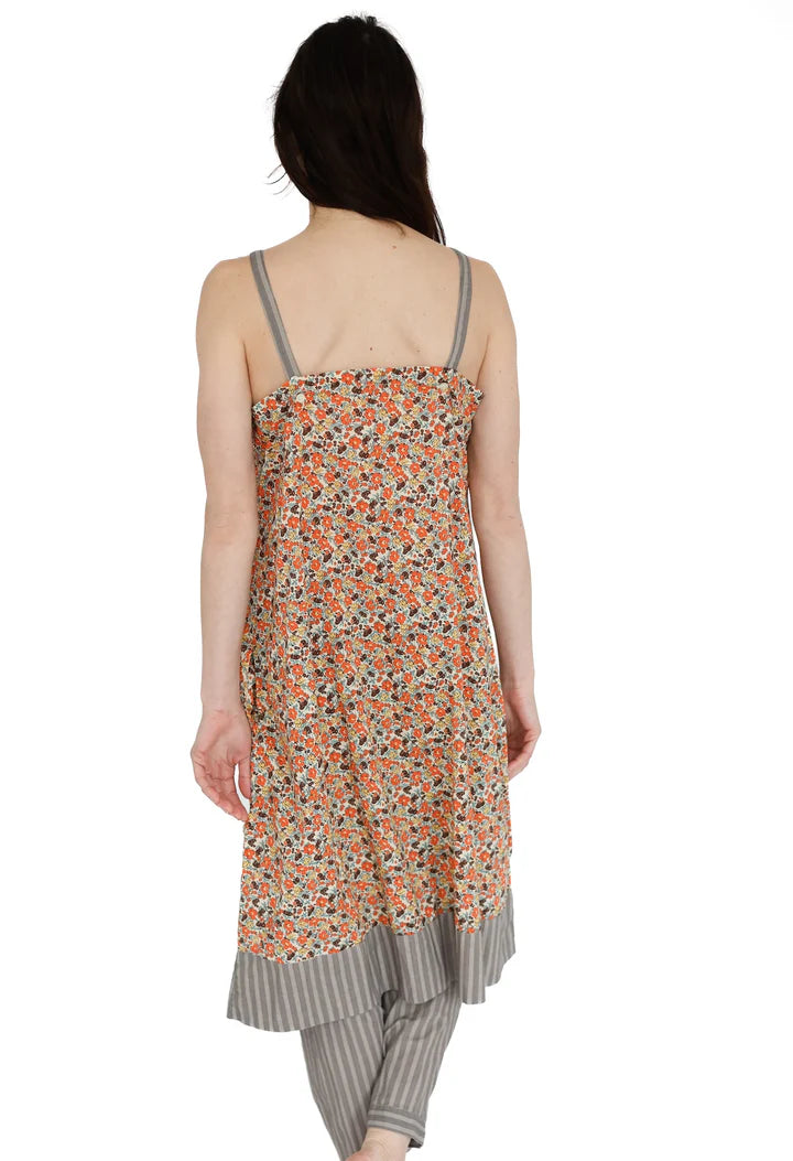 Woman wearing a floral dress with a white background

Domi slip dress nightgown organic cotton pjs pajamas sleepwear loungewear shop boston sowa boutique store gift
