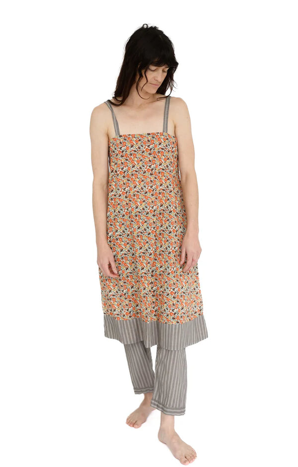 Woman wearing a floral slip dress and striped pants on a white background

Domi slip dress nightgown organic cotton pjs pajamas sleepwear loungewear shop boston sowa boutique store gift
