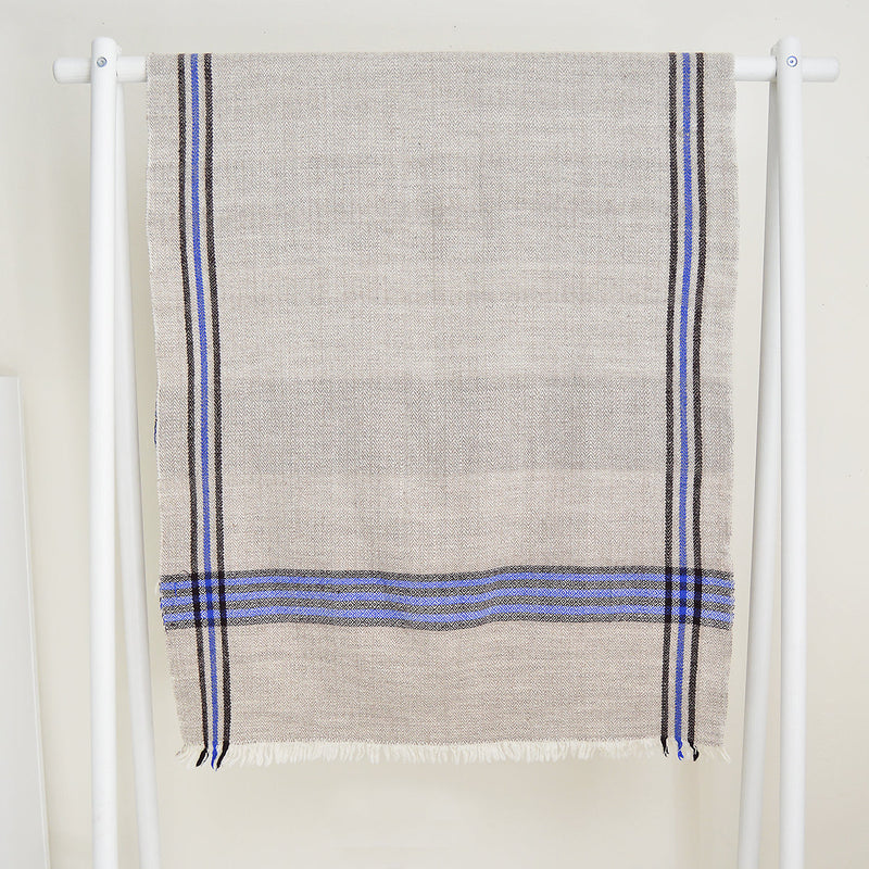 Super soft, 100% cotton khadi (homespun yarn and handwoven) throws in gorgeous plaid patterns. Made in India, these soft throws are perfect for cozying up this fall and winter while the bright colors make it a perfect throw to display year-round.  Choose from a pop of blue or  neutral white detailing. Made in India.