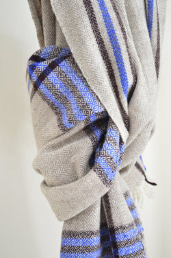 Super soft, 100% cotton khadi (homespun yarn and handwoven) throws in gorgeous plaid patterns. Made in India, these soft throws are perfect for cozying up this fall and winter while the bright colors make it a perfect throw to display year-round.  Choose from a pop of blue or  neutral white detailing. Made in India.