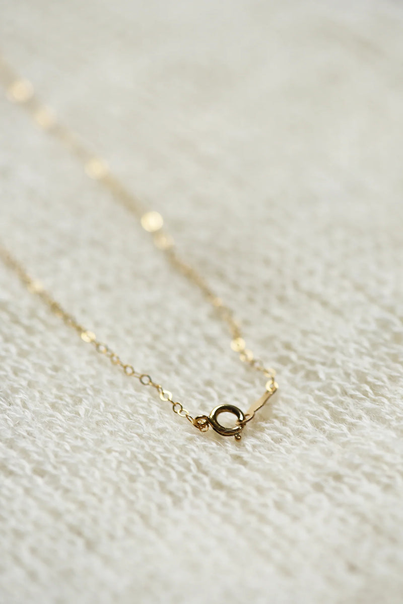 864 Design Brass knot necklace 20" chain. Shop Boston SoWA gift shop