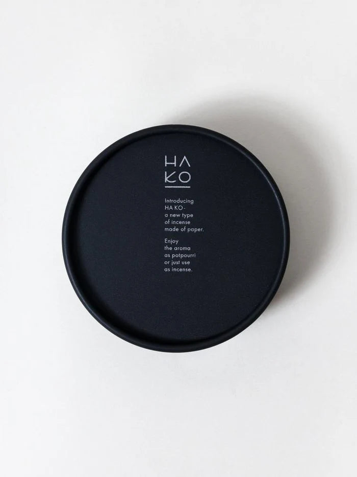 Black circular paper box with 'HAKO' branding on a white background

HA KO Paper Incense Gift Box Set of 6. Black No. 1 Relax Scents Home Fragrance Decor Made in Japan Shop SoWa Boston boutique