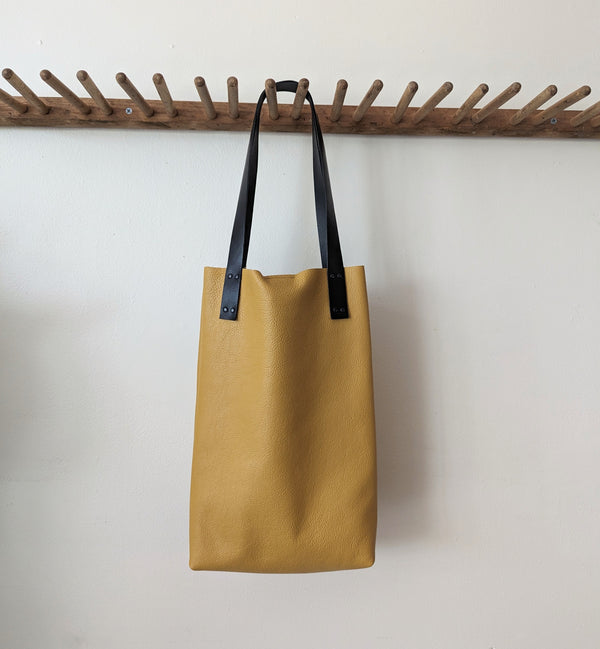 Stitch and Tickle Tall leather tote handmade boston shop boutique gift store sowa leatherwork leather shop leatherwork made in Boston