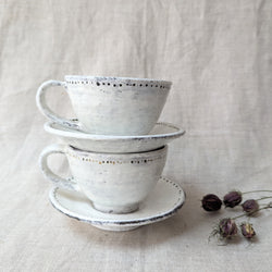 Handmade cup and saucer with black dots. Shop Boston sowa small business ceramic 