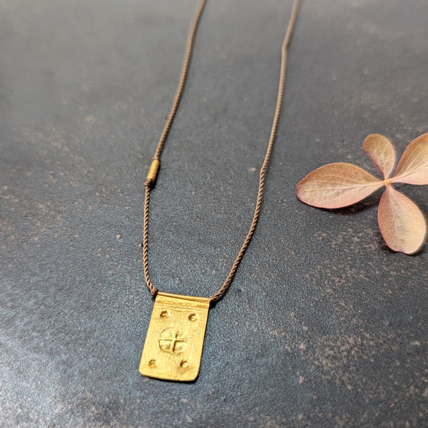 Hand-stamped talisman necklace River Song jewelry shop boston sowa gift shop gold 24k boutique