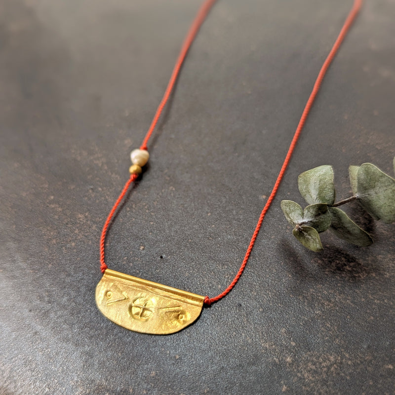 Hand-stamped talisman necklace River Song jewelry shop boston sowa gift shop gold 24k boutique