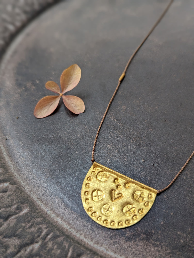 Hand-stamped talisman necklace River Song jewelry shop boston sowa gift shop gold 24k boutique