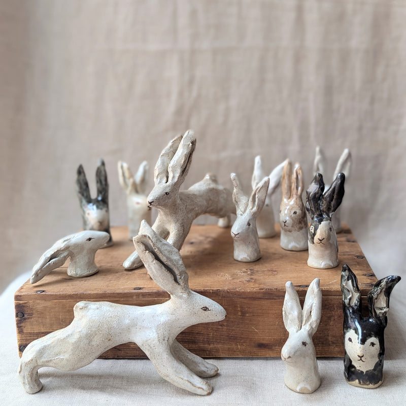 Handmade and hand-painted running rabbit ceramic sculptures by Charlotte salt sowa Boston gift shop boutique store small business