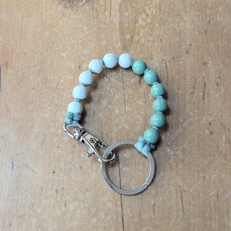Ina Seifart Perlen two tone wood beaded colorful Keychain bracelet wristlet fob holder short handmade gift shop sowa boston fashion accessories independent boutique 
