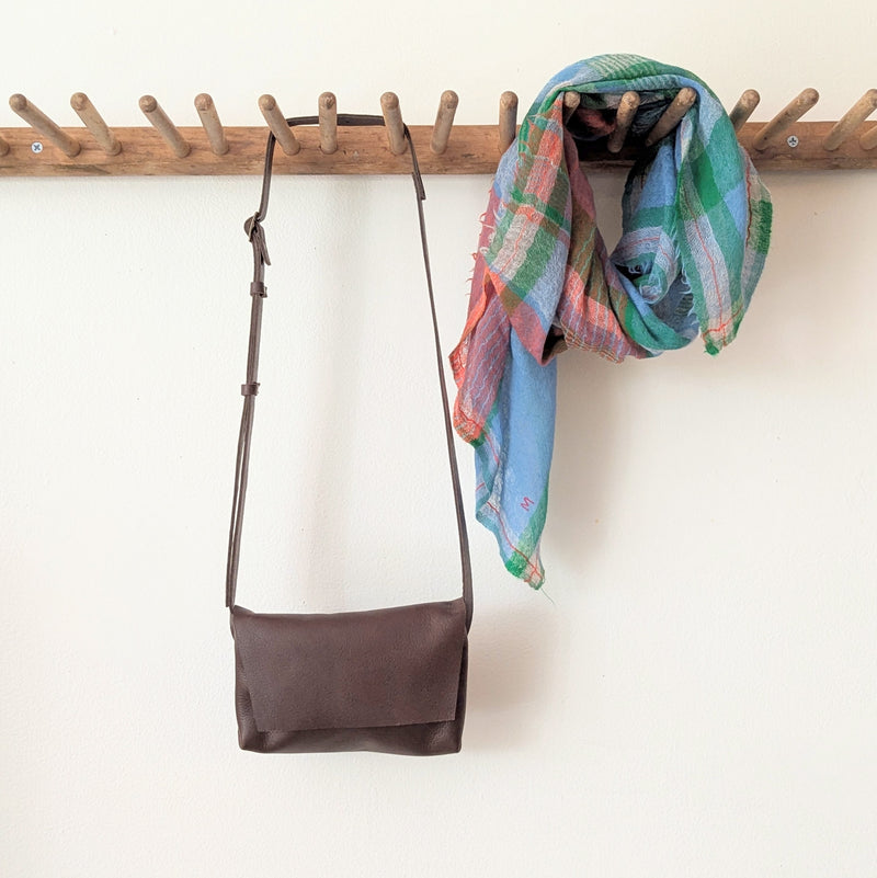 Stitch and Tickle handmade leather mini messenger bag crossbody made in Boston made in usa leatherwork leathercraft SoWa shop boutique gift store