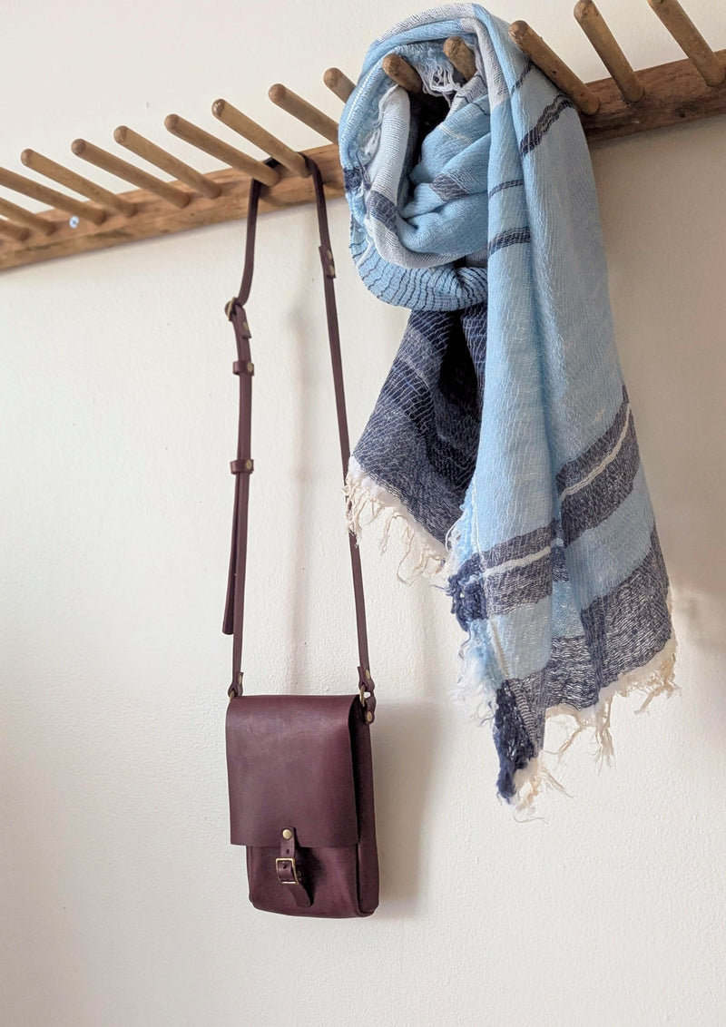 Stitch and Tickle handmade leather mini vertical narrow messenger bag crossbody made in Boston made in usa leatherwork leathercraft SoWa shop boutique gift store