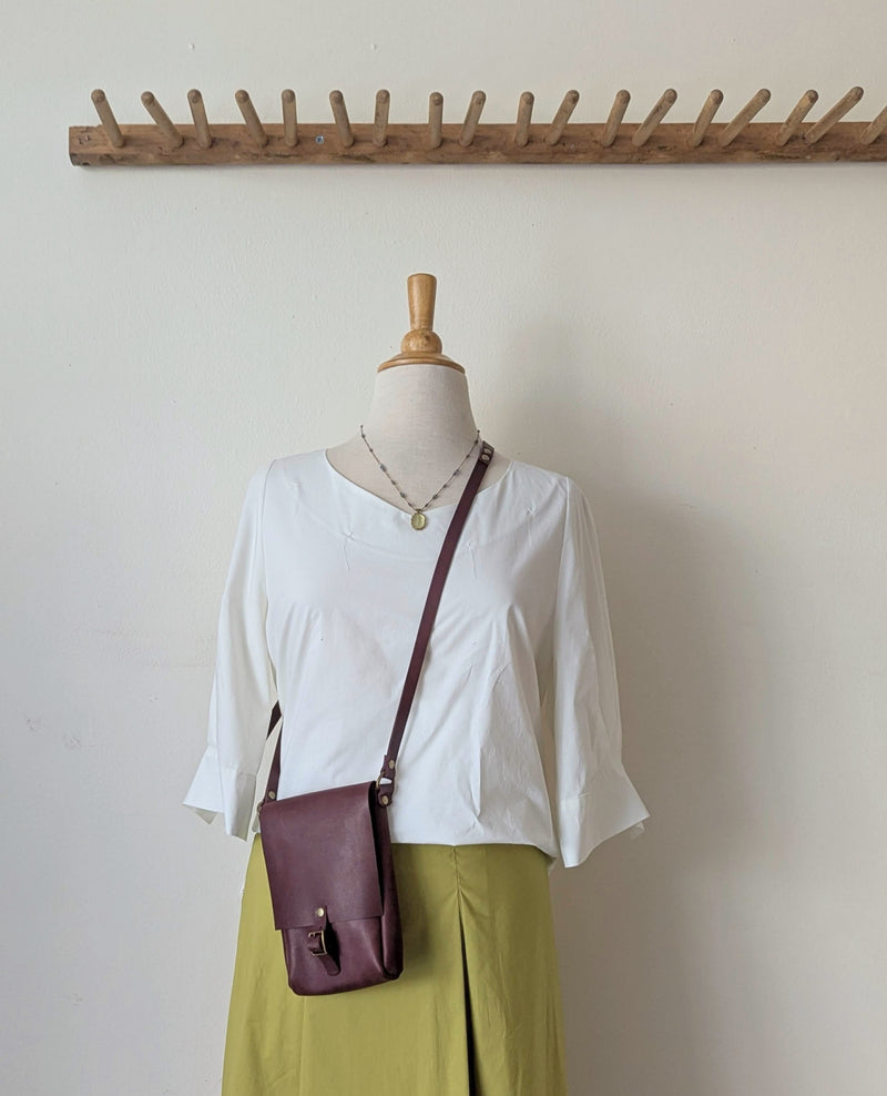 Stitch and Tickle handmade leather mini vertical narrow messenger bag crossbody made in Boston made in usa leatherwork leathercraft SoWa shop boutique gift store