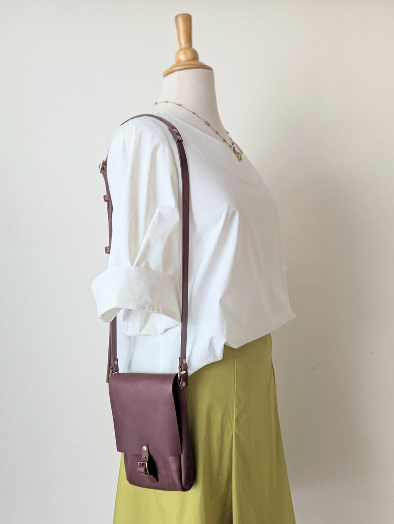 Stitch and Tickle handmade leather mini vertical narrow messenger bag crossbody made in Boston made in usa leatherwork leathercraft SoWa shop boutique gift store