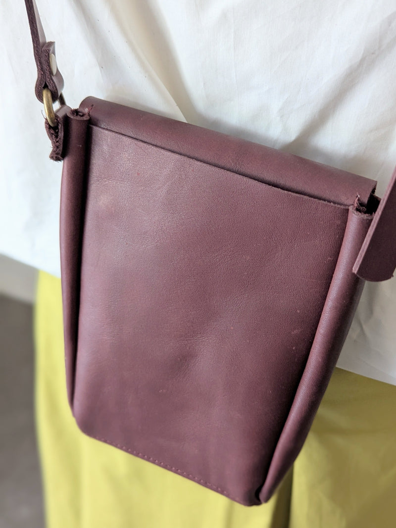 Stitch and Tickle handmade leather mini vertical narrow messenger bag crossbody made in Boston made in usa leatherwork leathercraft SoWa shop boutique gift store