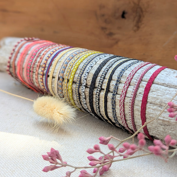 Set of colorful woven bracelets on wooden branch on a neutral background

Guanabana woven bracelet jewelry store sowa boston gift shop small business boutique small gifts for her 
