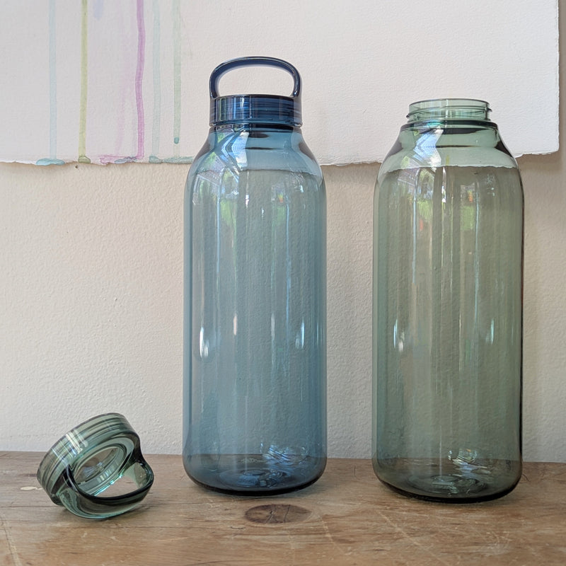 Two large water bottles with handles on a wooden surface.

Japanese water bottles plastic travel portable clear transparent BPA free KINTO sowa Boston gift shop boutique store