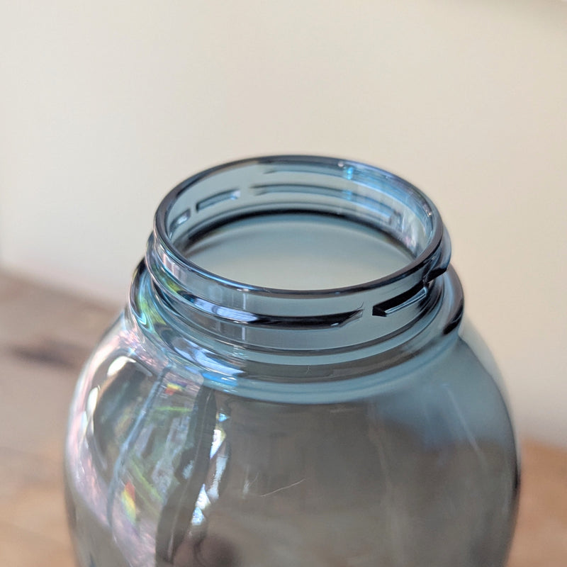 Mouth of a clear blue plastic water bottle on a neutral background

Japanese water bottles plastic travel portable clear transparent BPA free KINTO sowa Boston gift shop boutique store