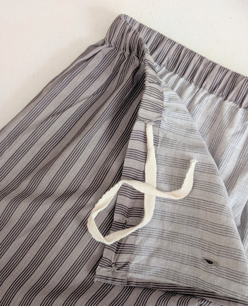 Striped pants with a white drawstring on a light background
Domi Midi organic cotton striped pants pjs pajamas sleepwear loungewear shop boston sowa boutique store gift
                                               