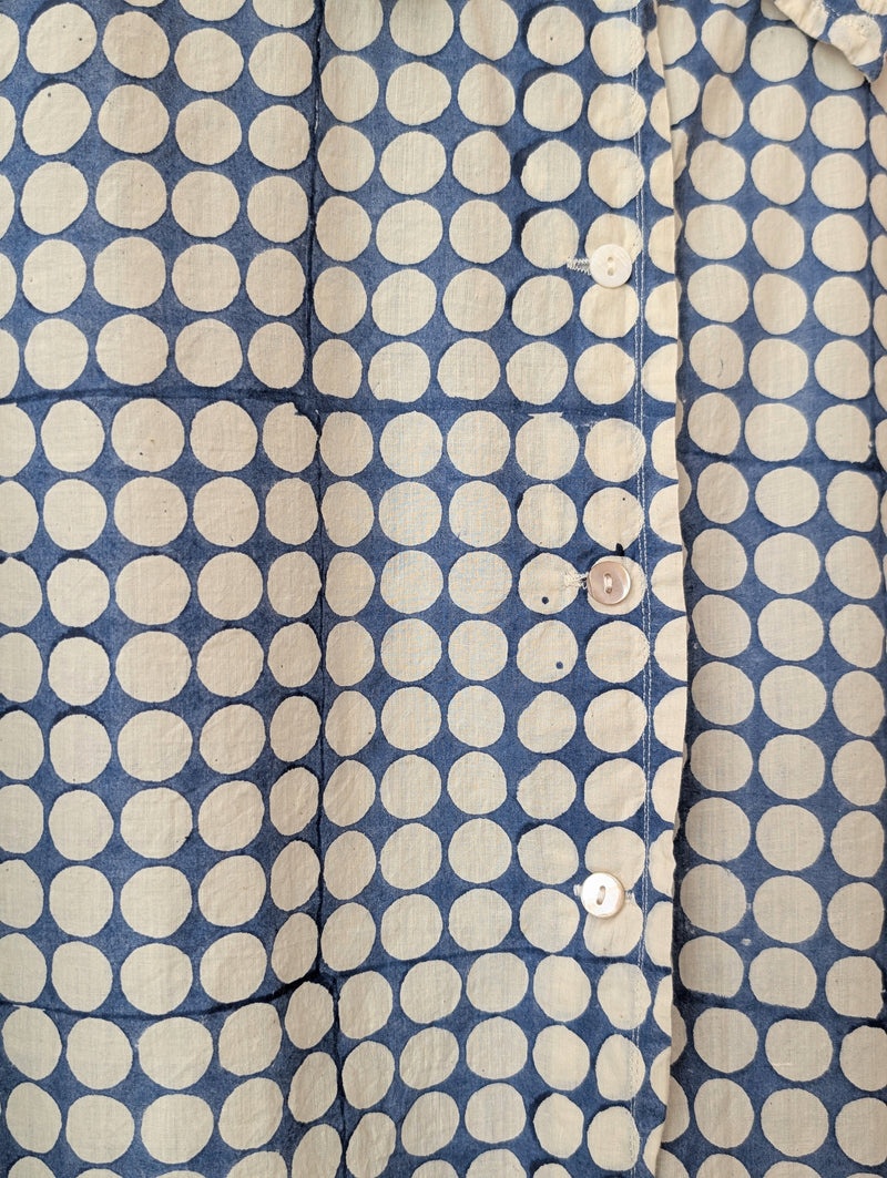 Close-up of a blue shirt with polka dot pattern

Auntie Oti button down cotton shirt polka dot block printed sowa boston small business gift shop boutique