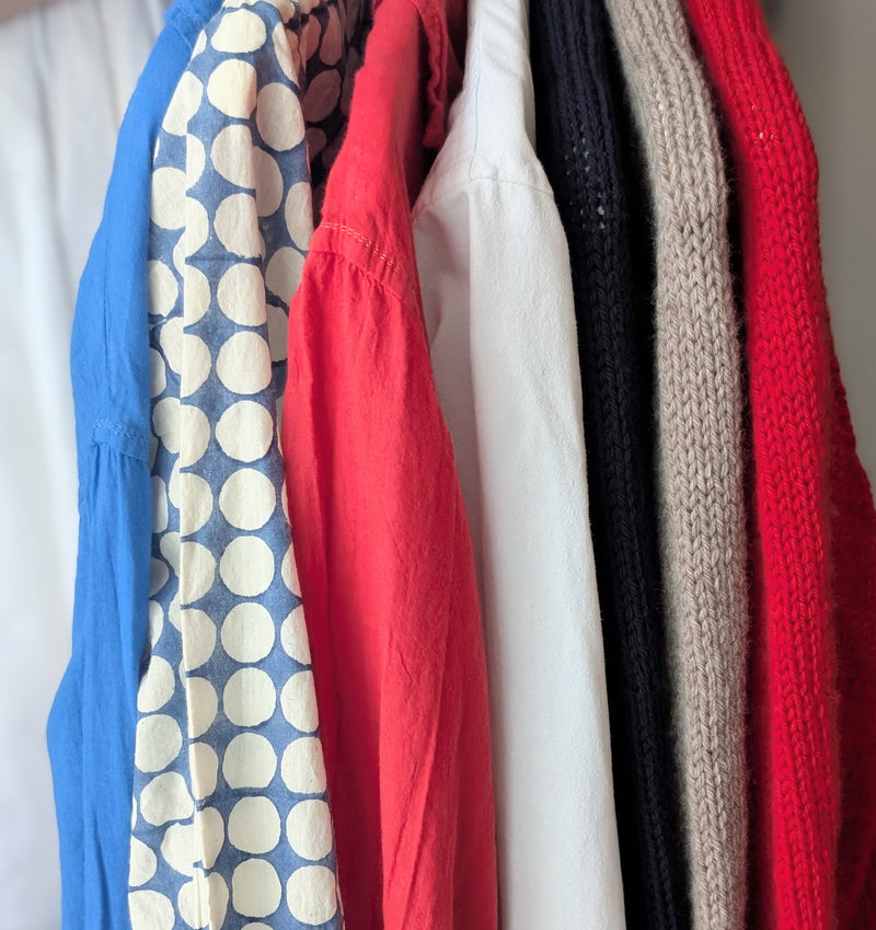 Collection of colorful sweaters hanging on a rack

Auntie Oti button down khadi cotton lightweight shirt sowa boston small business gift shop boutique
