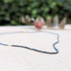 debbie fisher black spinel beaded necklace with gold accents