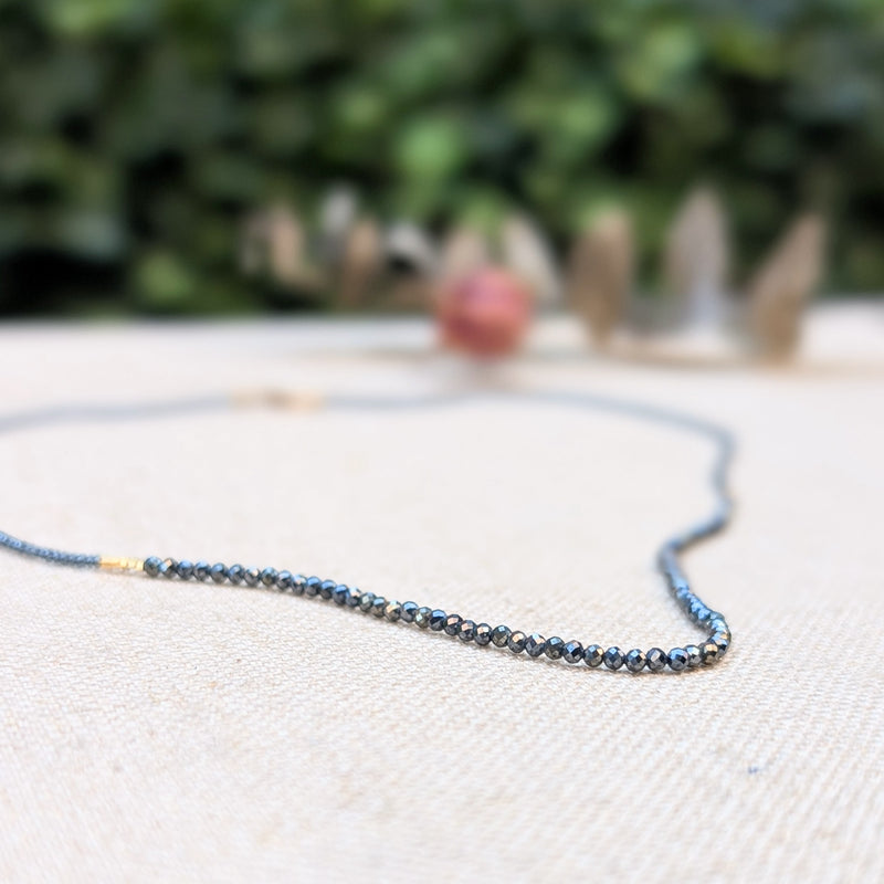 debbie fisher black spinel beaded necklace with gold accents