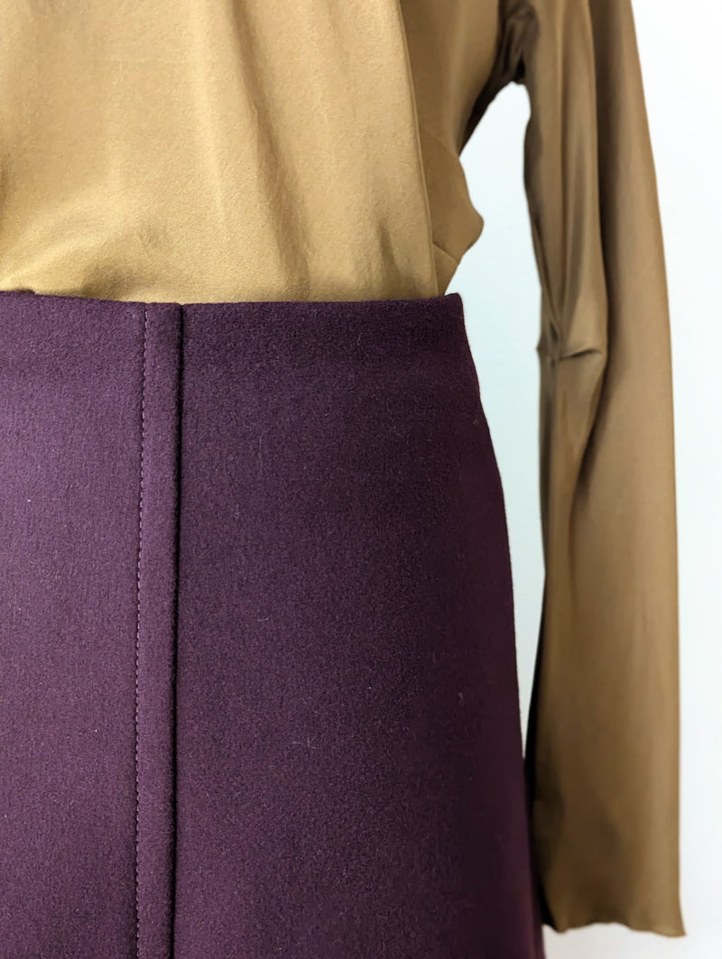 Bordeaux red skirt and brown top on a white background