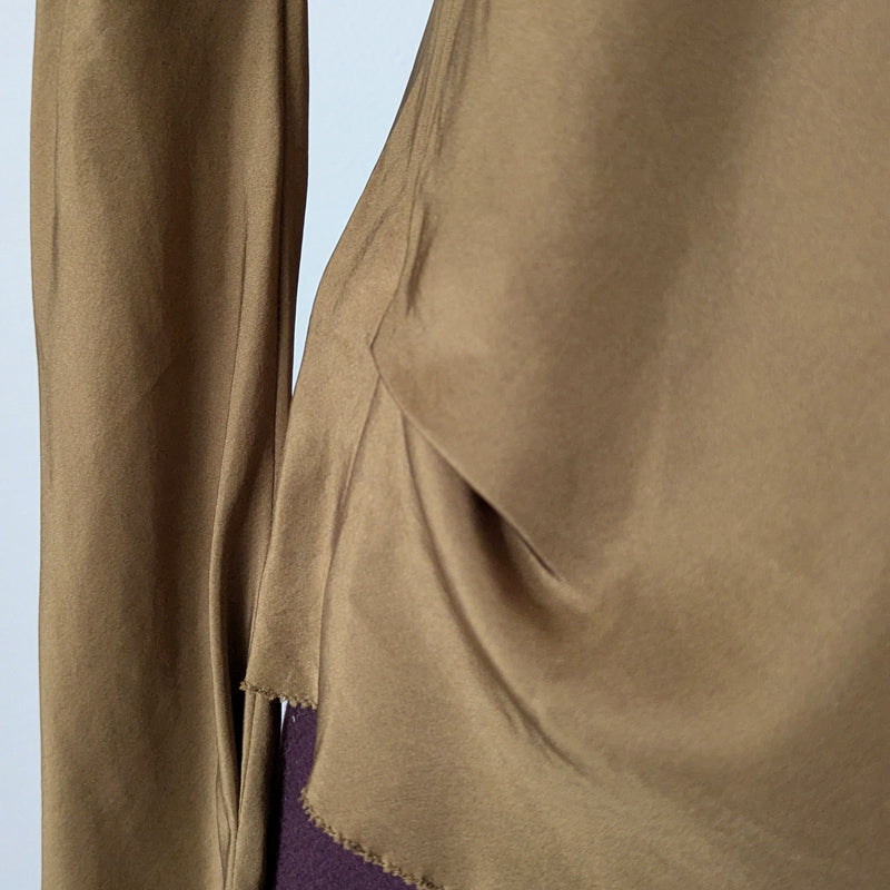 Tobacco brown draped silk blouse from Susanne Bommer on a mannequin 