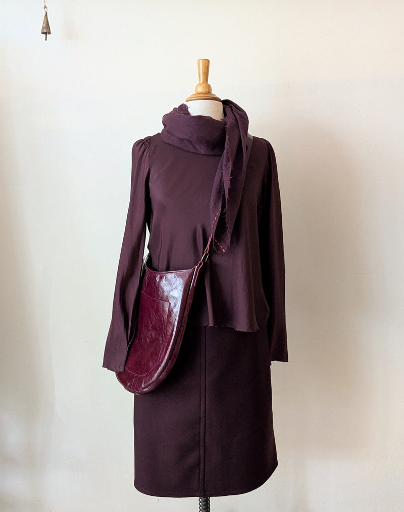 all Bordeaux outfit from Susanne bommer with a silk shirt, wool skirt, and a scarf and bag from stitch & tickle.