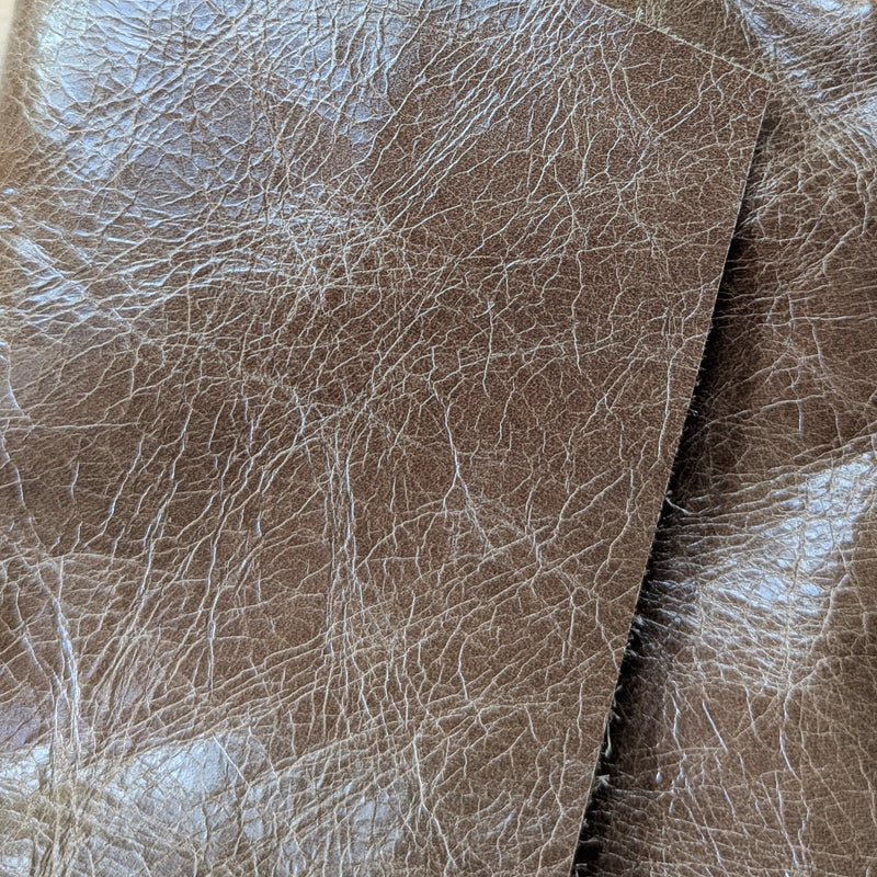 Close-up of the Stitch & Tickle mini messenger bag in Chai 