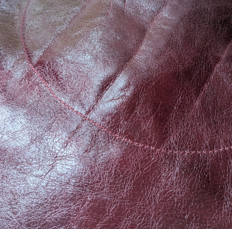 Close-up of the back of the Stitch and Tickle Luna Bag in Wine 