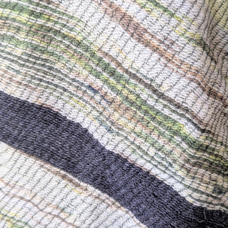 Close-up of woven fabric with multicolor pattern