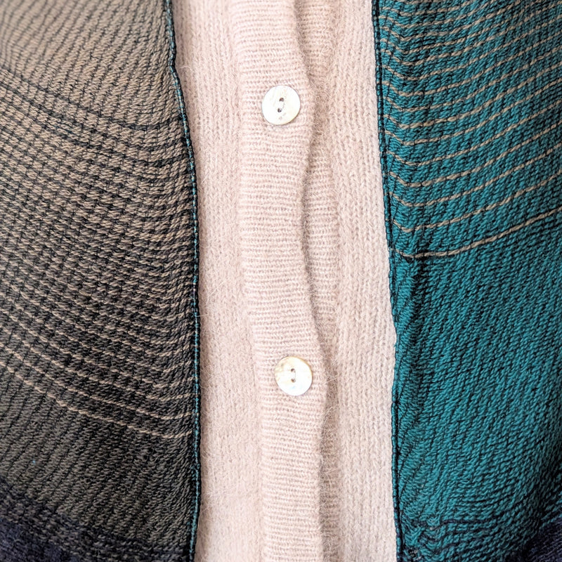Close-up of three different textured fabrics in brown, beige, and teal.