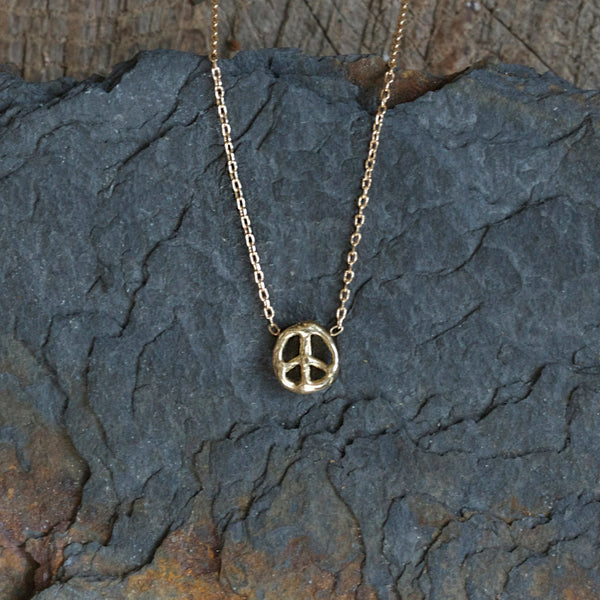 Emilie Shapiro Rough 14K gold peace sign necklace.  Boston shop sowa gift store small business boutique 