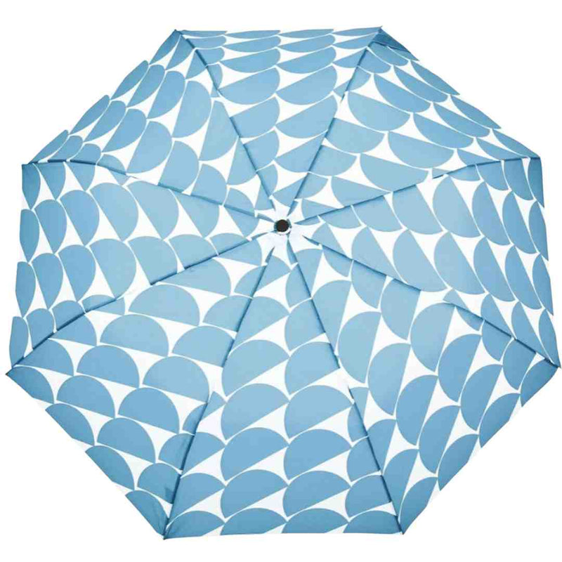 Umbrella with blue half circle pattern against a matching background