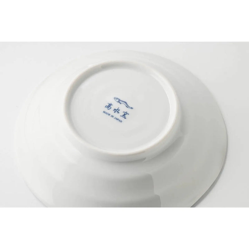 White ceramic plate with blue text on a white background