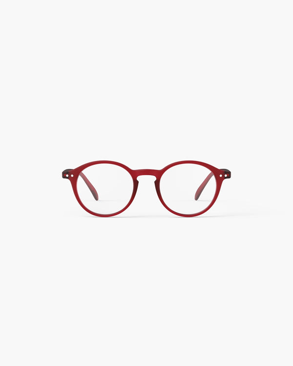 Red eyeglasses on a white background