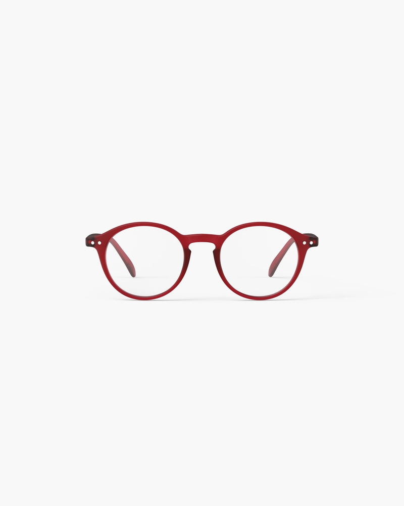 Red eyeglasses on a white background