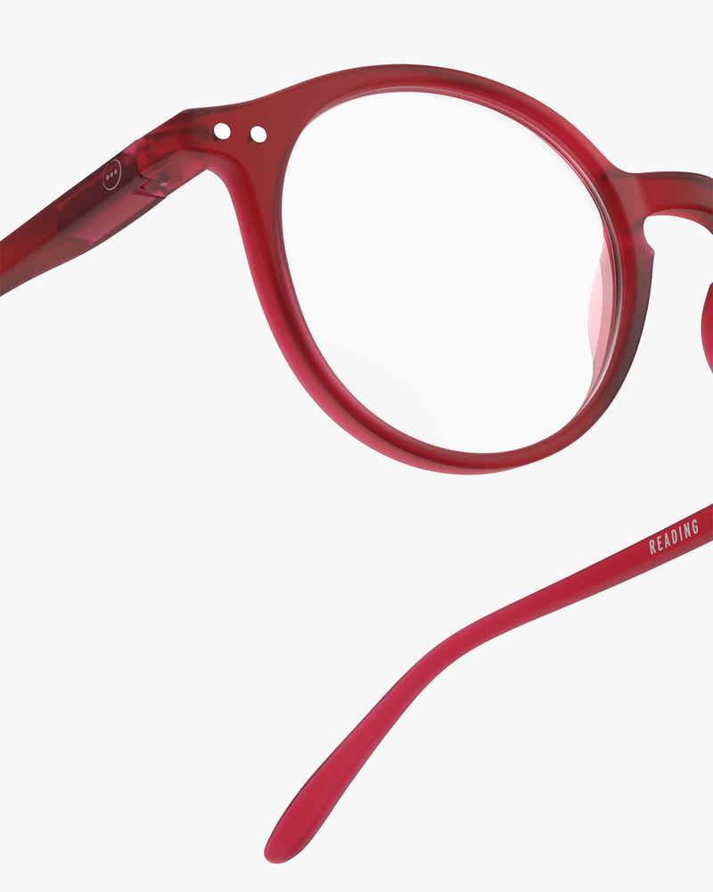 Red eyeglasses on a white background