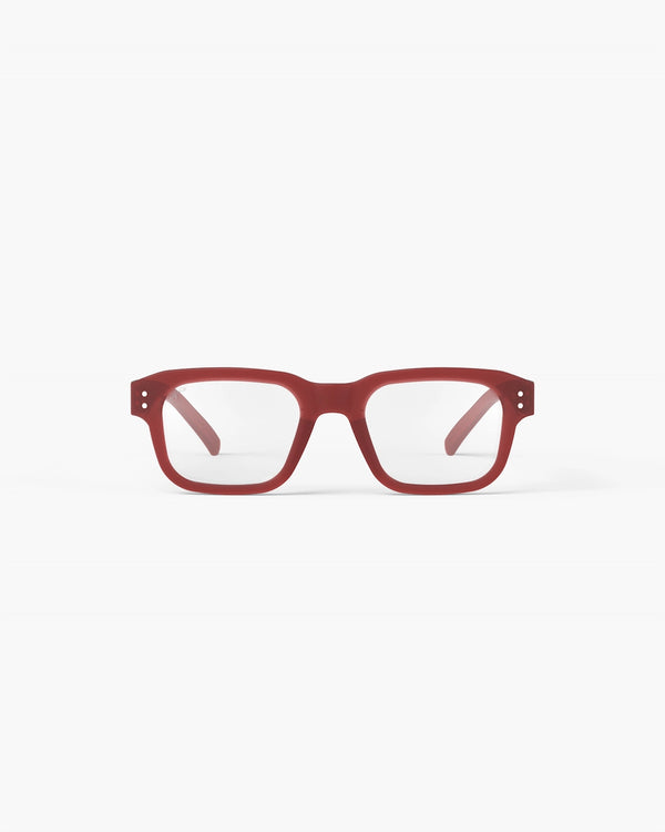 Red rectangular eyeglasses on a white background