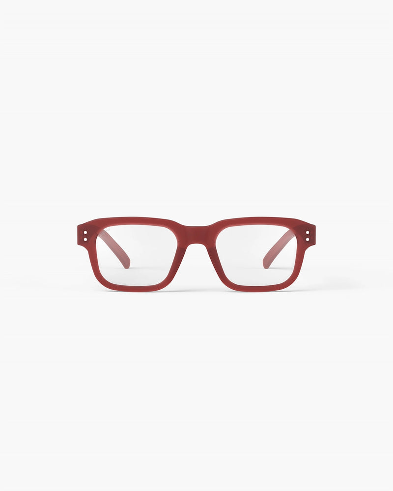 Red rectangular eyeglasses on a white background
