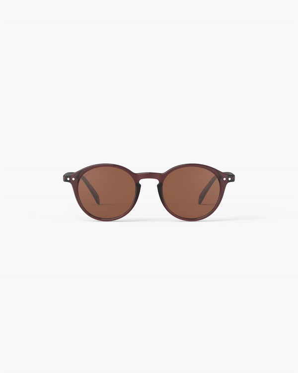 Brown round sunglasses with brown lenses on a white background